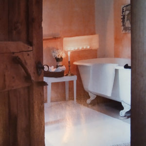 Rustic bathroom by candlelight
